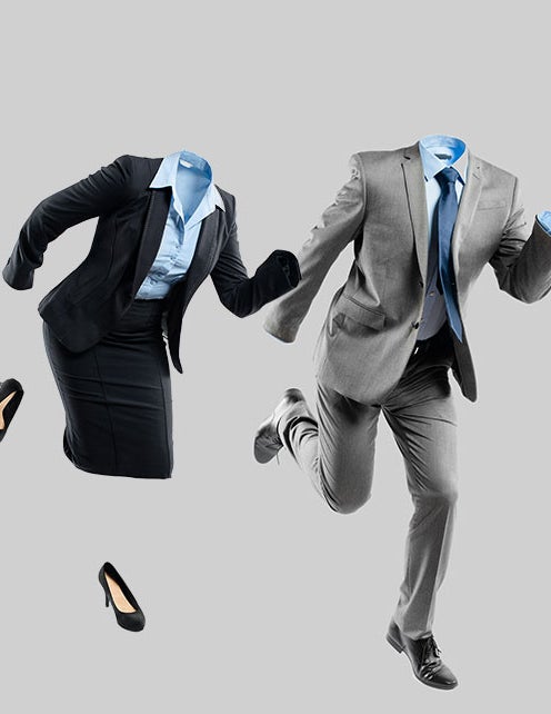 Running on empty: Two empty suits (no human bodies) in a sprint.