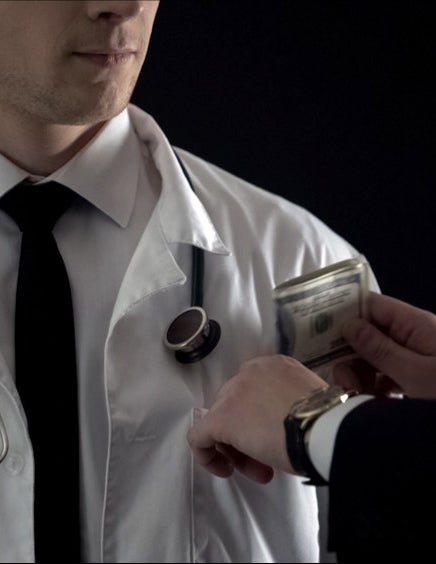 Fraud kickback doctor money