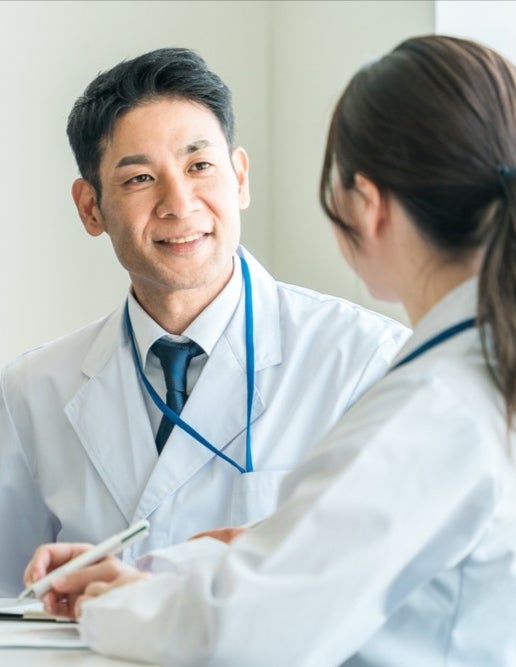 A man and woman in white coats